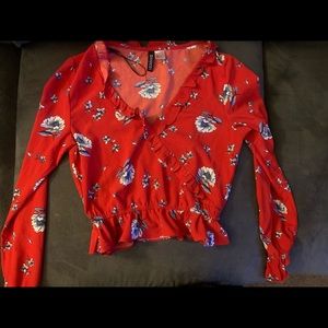 Red floral blouse